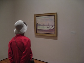 admiring a Seurat at MOMA